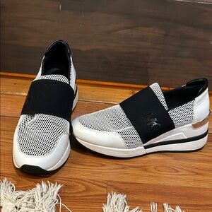 Michael Kors Black and White Slip-On Athletic Sneakers